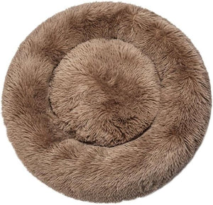 Round brown fur pet bed on a white background at Pet Servo