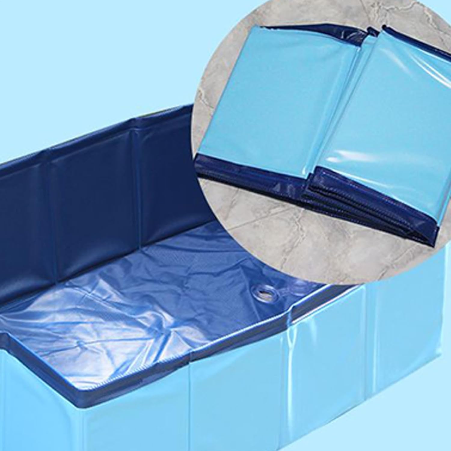 Blue inflatable pool with a close-up of the zipper on a light blue background at Petservo