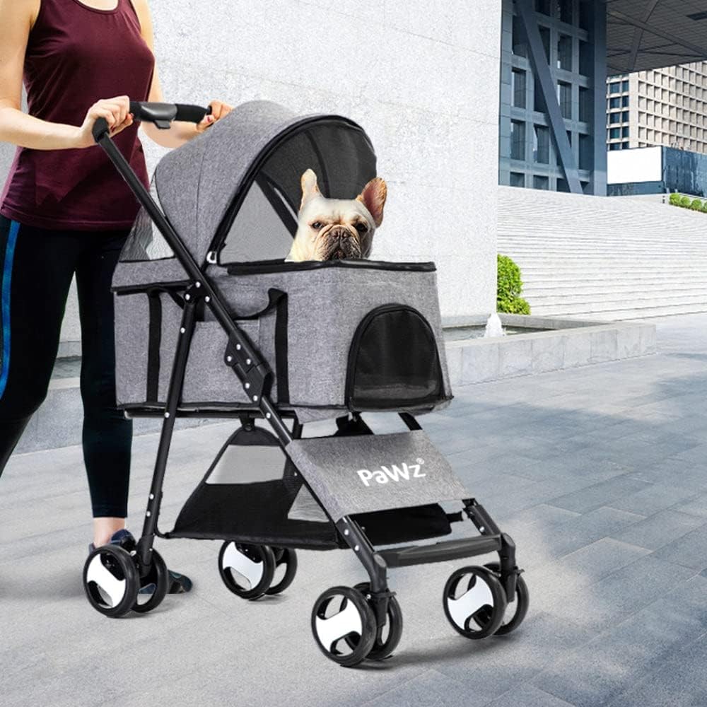 Person pushing a gray pet stroller with a dog peeking out, on a city street at Pet Servo