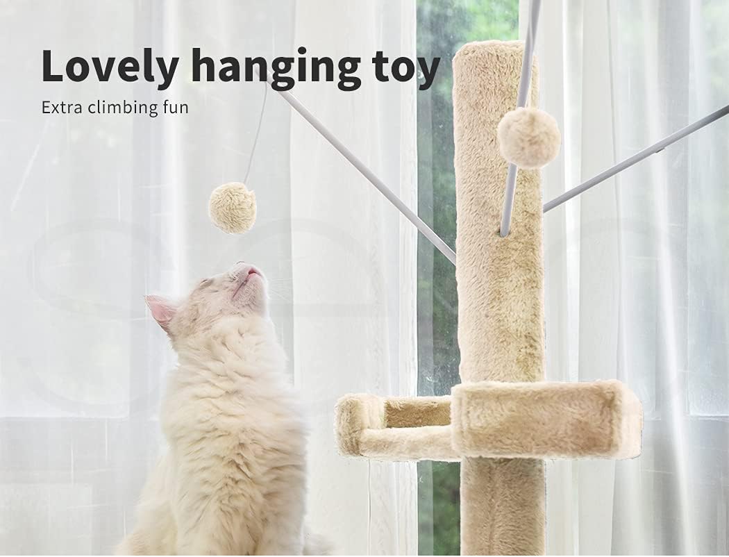 A fluffy cream-colored cat sits and looks up at a beige hanging cat tree toy with pom-pom balls in a bright room with sheer curtains. Text on the image reads 'Lovely hanging toy' and 'Extra climbing fun' at Pet Servo