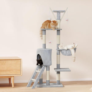 Cat tree with multiple levels and cats on a light-colored floor at Pet Servo