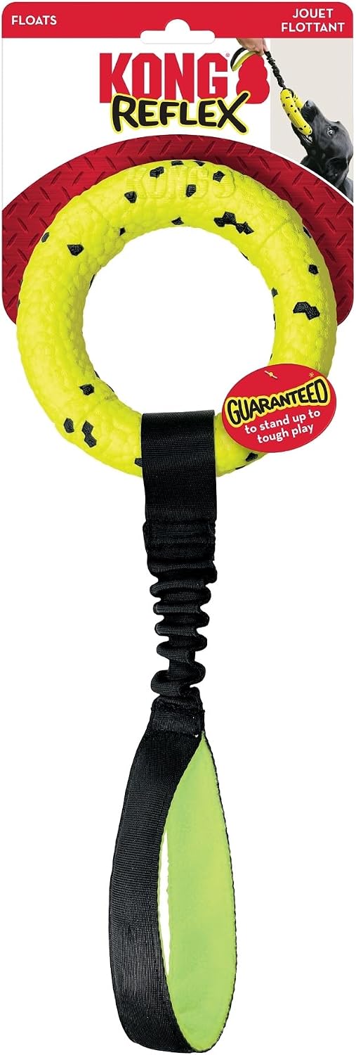 Kong Reflex Joust Floats dog toy in its original retail packaging. The toy features a bright yellow ring with black spots, a black elastic band, and a black and lime green handle at Pet Servo