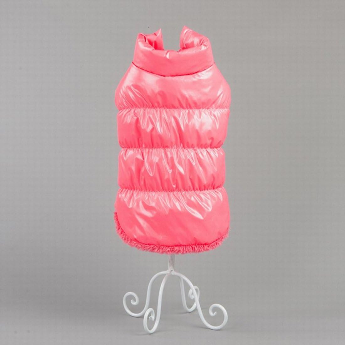 Pink puffer vest on a mannequin against a gray background at Pet Servo