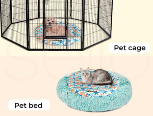 A pet enclosure set showing a black metal pet cage with a small dog inside and a fluffy round pet bed with a gray cat lying on it. The cage is labeled 'Pet cage' and the bed is labeled 'Pet bed' on a pale beige background at Pet Servo