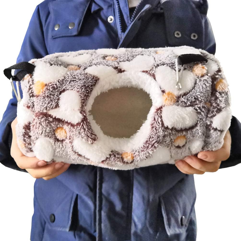 Person holding a fluffy, textured cushion with a circular design at Pet Servo