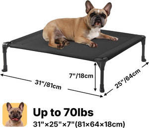 A tan French Bulldog lies on a black elevated pet bed with dimension arrows and text showing 31 x 25 x 7 inches (81 x 64 x 18 cm) and up to 70 lbs capacity, on a white background.