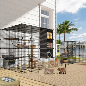 Large black pet playpen with multiple levels and accessories on a patio at Pet Servo.