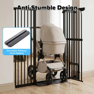 Black metal anti-stumble gate installed on a wooden floor in a home setting, with a stroller positioned behind it. The image includes text reading 'Anti-Stumble Design' and a blue inset showing textured guide pads that prevent the stroller from sliding through at Pet Servo