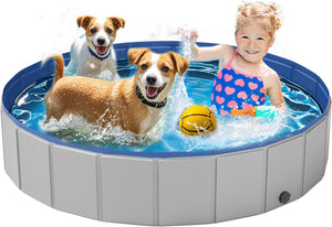 Two dogs and a child playing in an inflatable pool with toys at Pet Servo