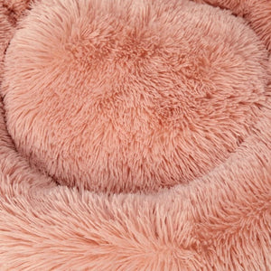 Close-up of a pink fluffy fabric texture at Pet Servo