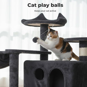 A calico cat actively playing with a dark gray cat toy on a multi-level cat tree, with the text 'Cat play balls Keep your cat active' at the top of the image at Pet Servo