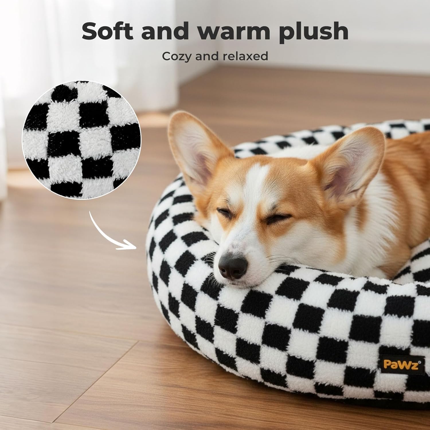 Dog lying on a checkered pet bed with soft plush texture, featuring the brand 'Pawz' at Pet Servo