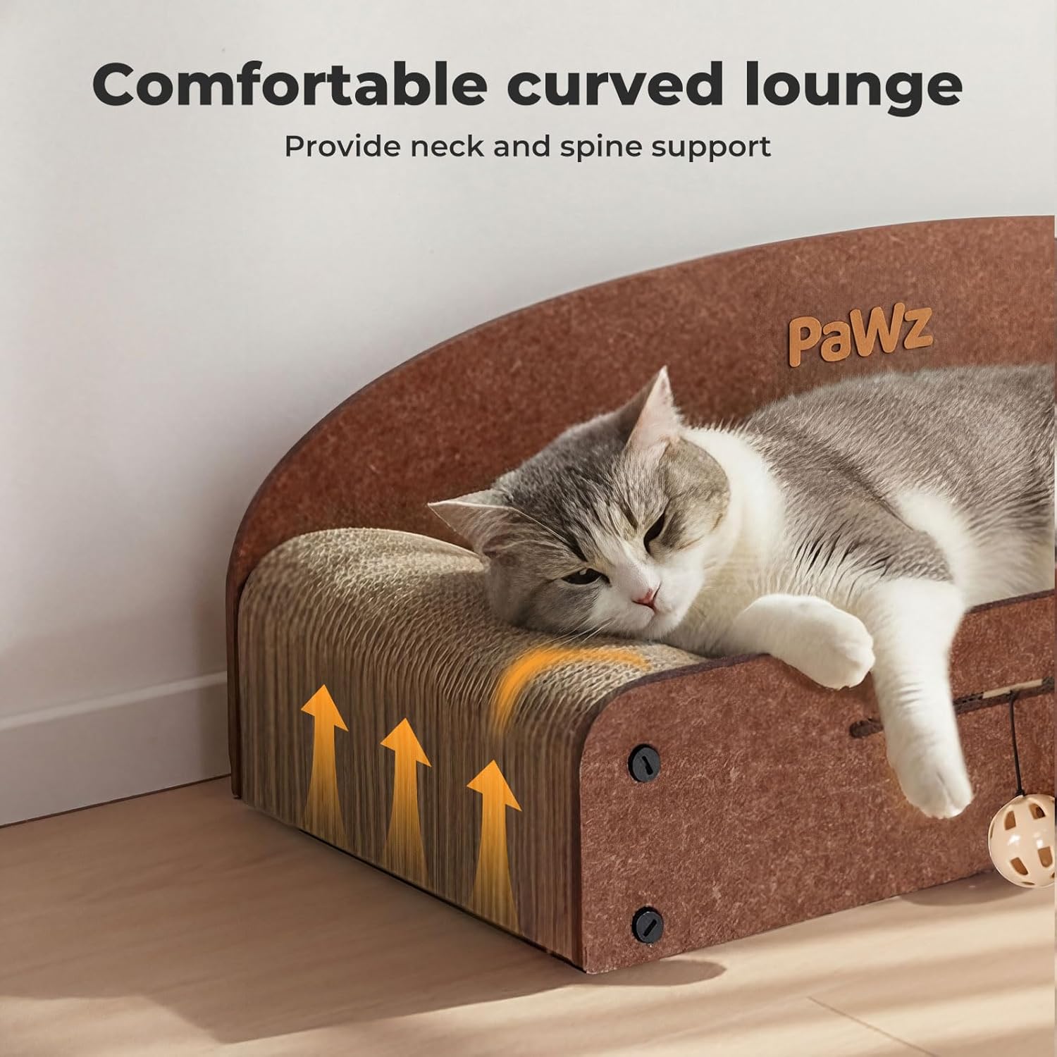 A gray and white cat rests on a curved brown cat lounge bed with scratching panels, shown in a home setting with text at the top reading 'Comfortable curved lounge' and 'Provide neck and spine support.' The brand name 'PaWz' appears on the product at Pet Servo