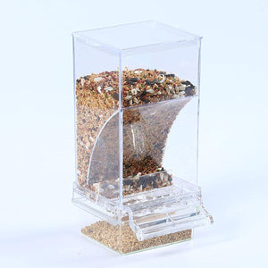 Clear bird feeder filled with birdseed on a white background at Pet Servo