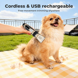 Dog being groomed with a cordless grooming tool in an outdoor setting at Pet Servo