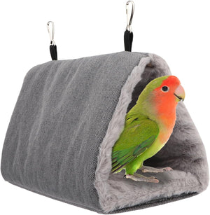 Gray bird hammock with a colorful parrot inside on a white background at Pet Servo