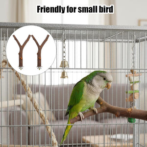 Green parrot in a cage with a branch and bell, labeled 'Friendly for small bird' at Pet Servo