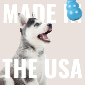 Dog with open mouth and blue K9 toy, 'Made in the USA' text on beige background at Pet Servo
