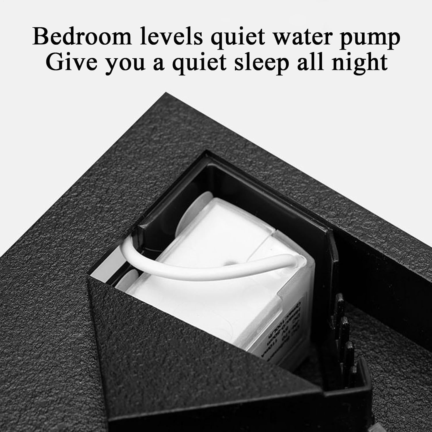 Quiet water pump inside a black cabinet with text highlighting its noise reduction feature at Pet Servo