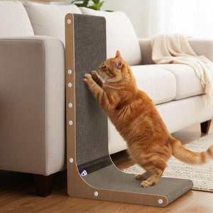 Cat using a scratching post next to a sofa in a living room at Pet Servo