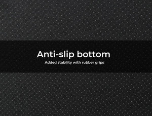 A close-up of a black textured fabric with a fine dotted pattern, featuring a central black banner with white text that reads 'Anti-slip bottom' and 'Added stability with rubber grips' at Pet Servo