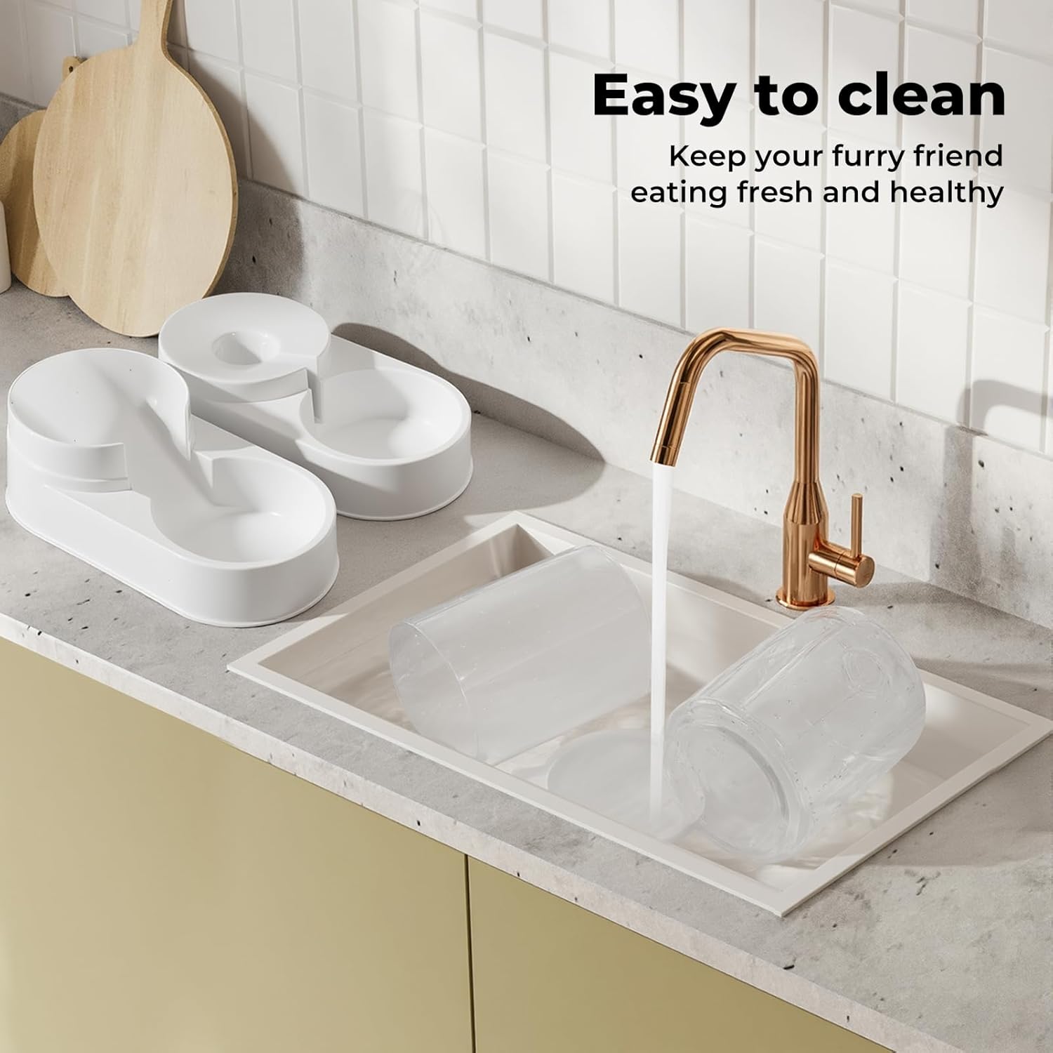 White pet bowls on a kitchen counter with running water from a faucet, text 'Easy to clean' and 'Keep your furry friend eating fresh and healthy' at Pet Servo
