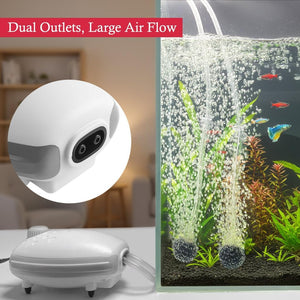 Aquarium air pump with dual outlets and large air flow, shown with an aquarium setup at Pet Servo