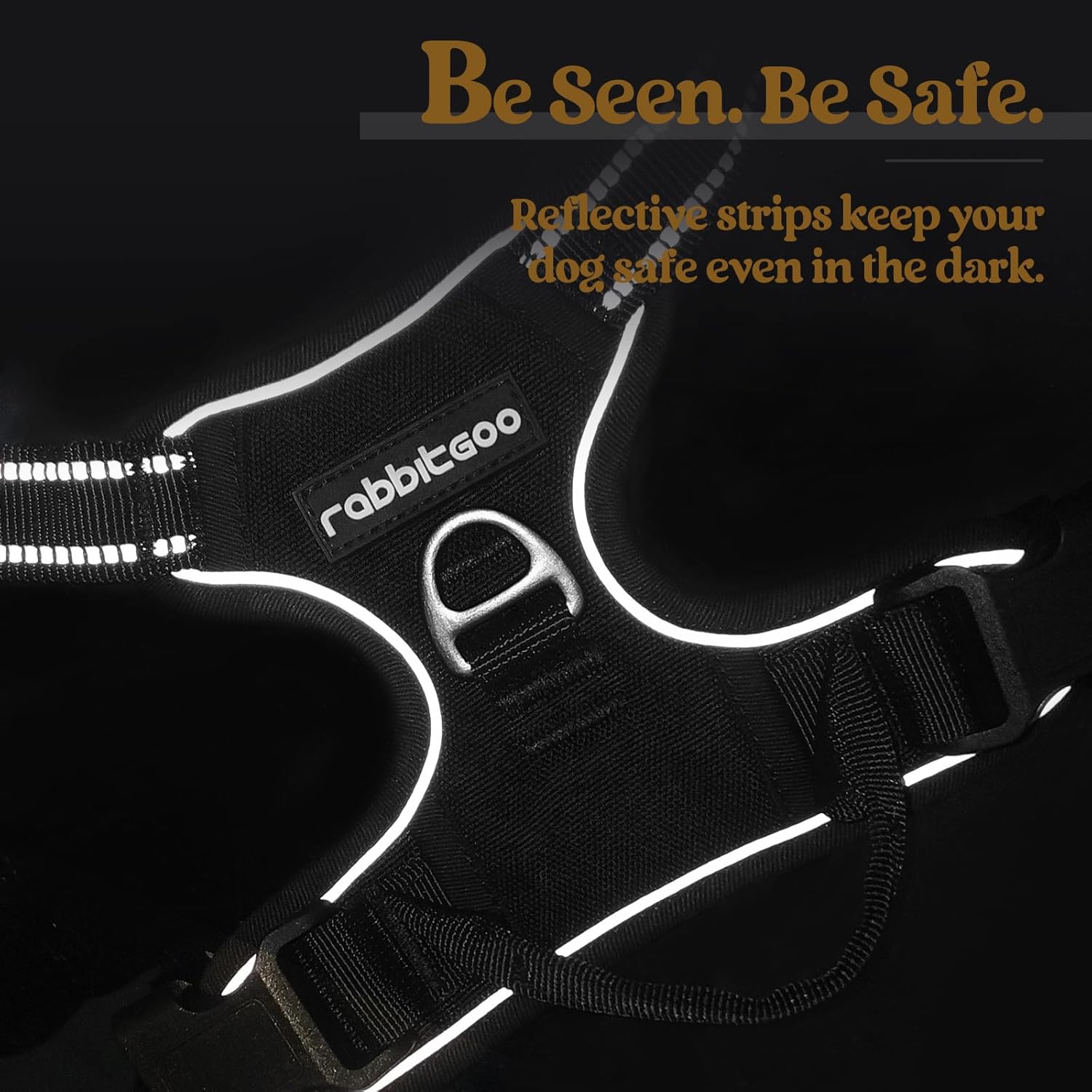 Black dog harness with reflective strips and 'rabbittgoo' branding on a dark background at Pet Servo