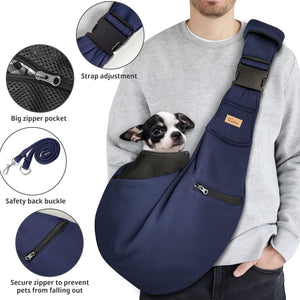 Navy blue pet sling with features highlighted on a person wearing it, showing a dog inside at Pet Servo