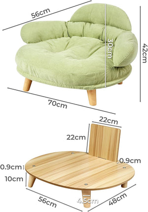 Green cushioned chair with wooden table and dimensions labeled at Pet Servo
