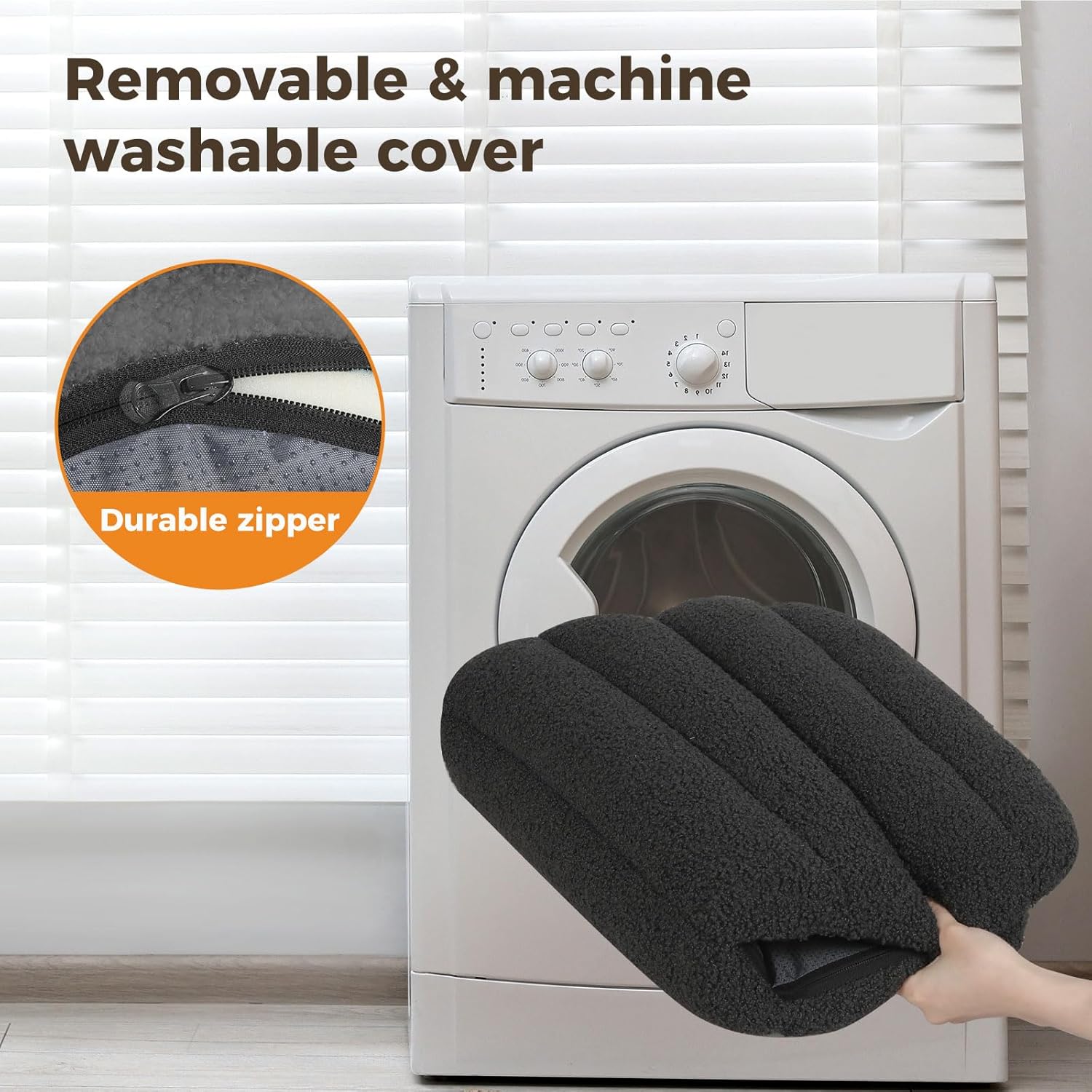 Black cover with durable zipper held in front of a washing machine, emphasizing its removable and machine-washable nature at Pet Servo