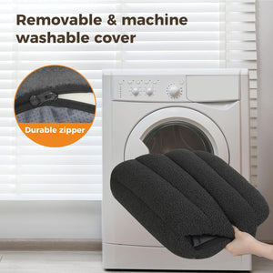 Black cover with durable zipper held in front of a washing machine, emphasizing its removable and machine-washable nature at Pet Servo