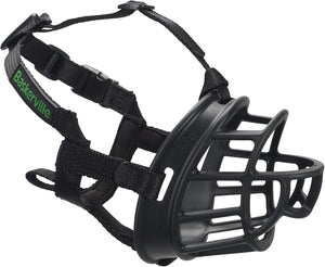 A black dog muzzle with a wire cage face guard and adjustable black straps, featuring the green 'BakerVille' brand name on one strap, shown on a plain white background.