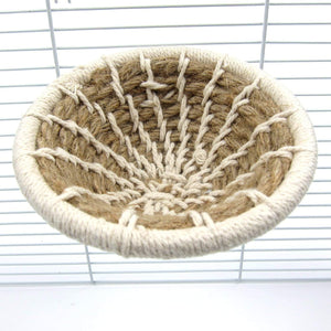 Woven bowl made of natural fibers on a white background at Pet Servo
