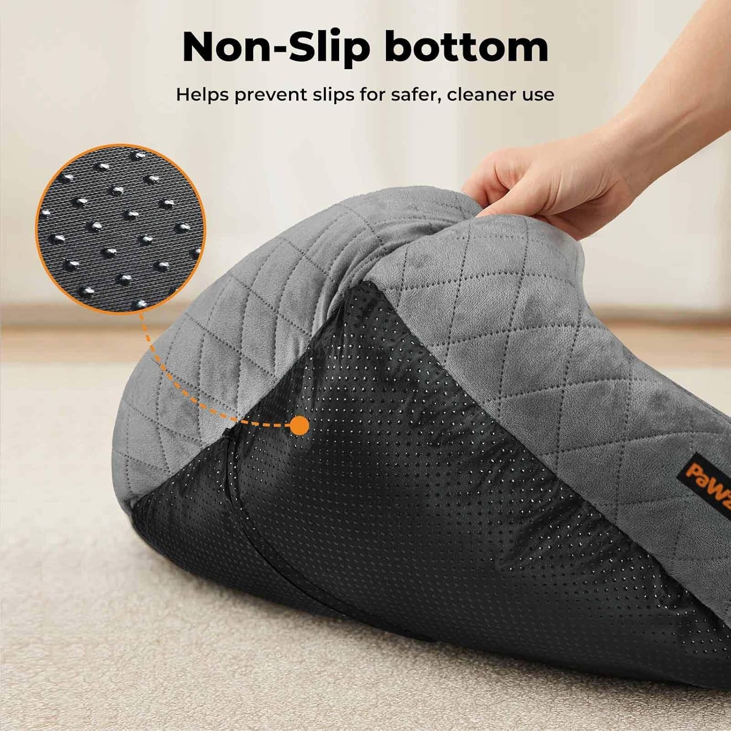 Gray and black cleaning tool with non-slip bottom feature on a light background at Pet Servo