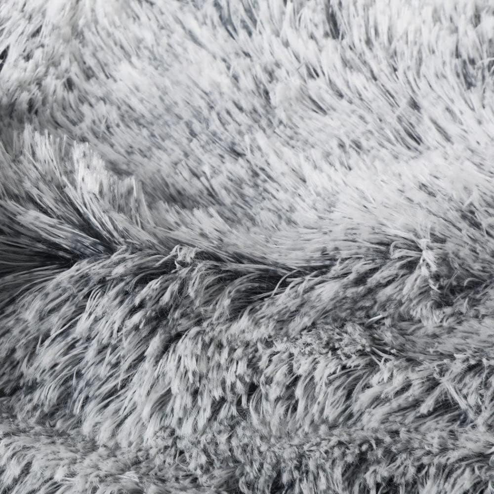 Close-up of gray fluffy fabric texture at Pet Servo
