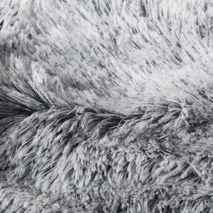 Close-up of gray fluffy fabric texture at Pet Servo