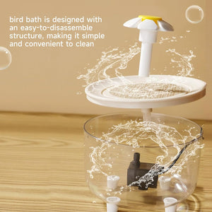 Bird bath with water splashes on a wooden surface, featuring text about its easy-to-disassemble design at Pet Servo