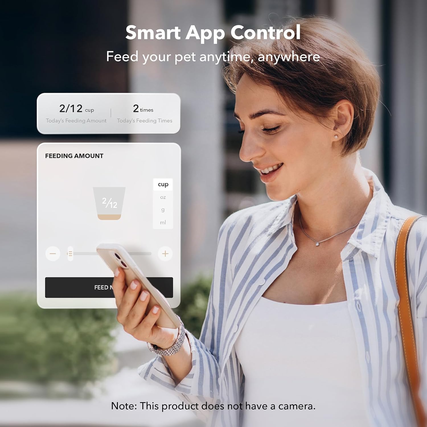 Woman using a smartphone app for smart pet feeding control outdoors.