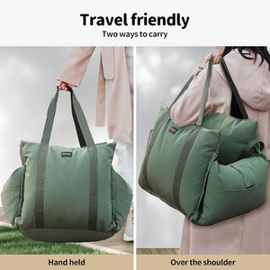 A green collapsible duffel bag shown in two carrying styles: held by a person's hand on the left and carried over the shoulder on the right. The image includes text reading 'Travel friendly' and 'Two ways to carry' at the top, with 'Handheld' and 'Over the shoulder' labels at the bottom at Pet Servo