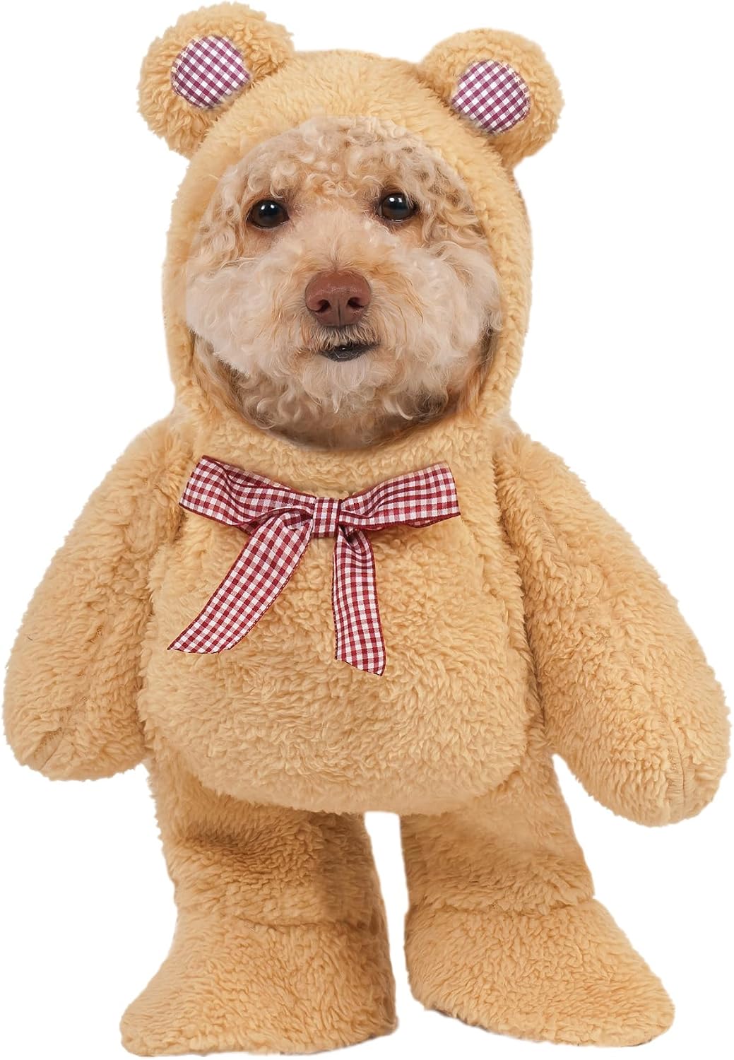 A small dog wearing a plush teddy bear costume, featuring a tan fuzzy body, bear ears with red-and-white gingham inner patches, and a matching red-and-white gingham bow at the neck, shown on a plain white background at Pet Servo