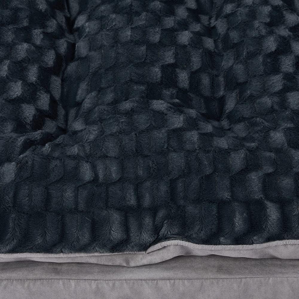 Close-up of a textured dark gray blanket with a soft surface at Pet Servo