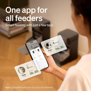 Person holding a smartphone with an app displaying feeding schedules for pets, with text 'One app for all feeders' and 'Smart feeding with just a few taps' at Pet Servo