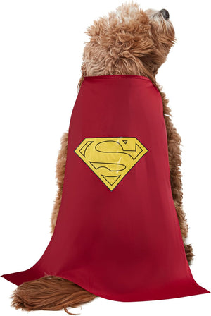 A small brown dog wearing a red cape with a yellow Superman-style chest emblem, shown against a plain white background at Pet Servo