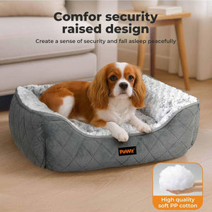 Dog lying on a gray pet bed with 'Comfor security raised design' text and a Pawz logo at Pet Servo