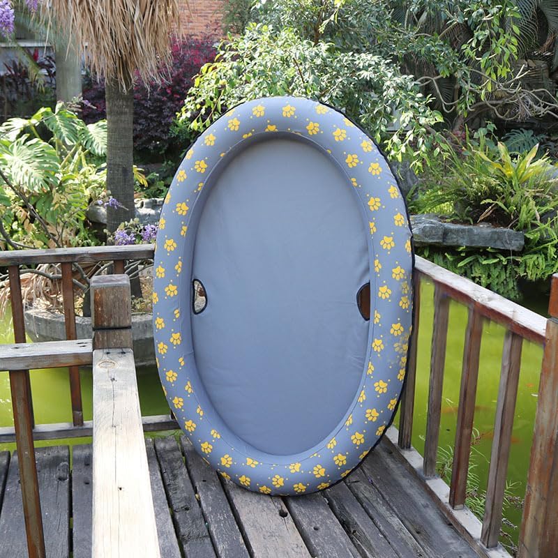 Round blue object with yellow floral pattern on a wooden deck with greenery in the background at Pet Servo