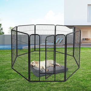 Black metal pet playpen with a dog inside on a grassy area at Pet Servo