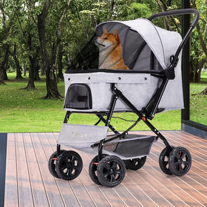 Pet stroller with a dog inside, parked on a wooden deck with trees in the background at Pet Servo
