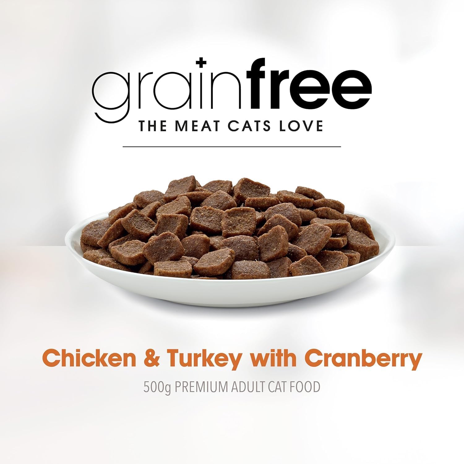 Cat food in a bowl with 'grainfree' branding on a white background