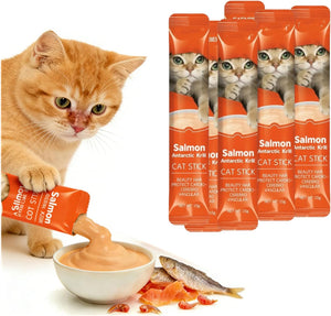 Cat sticks with salmon flavor, a cat holding one, and a bowl of the product on a white background at Pet Servo